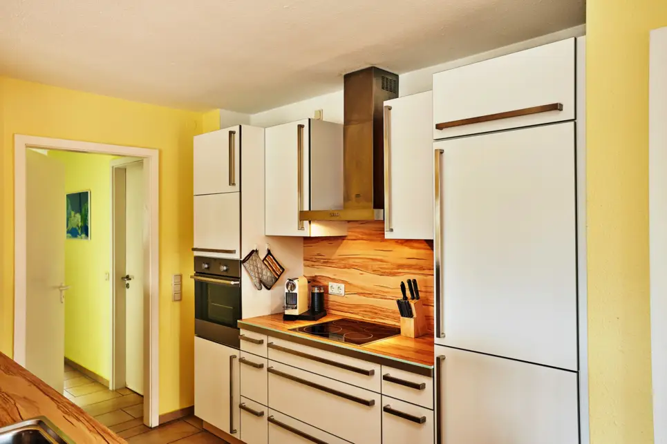 Kitchen area in one of the apartments at the H+ Hotel Ferienpark Usedom - Official website