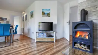 Stove in the apartment - H+ Hotel Ferienpark Usedom - Official website